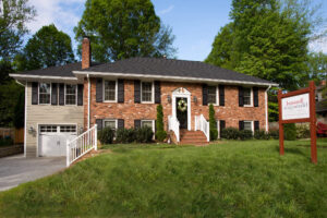 Alexandria home with new single car garage and sunroom addition